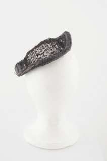 Really neat mid 1930s hat. Hat is Made out of a light black woven 