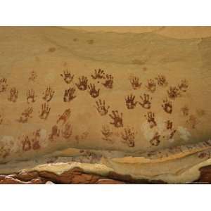  Ancient Indian Handprints Decorate a Sandstone Wall 