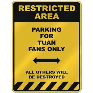  RESTRICTED AREA  PARKING FOR TUAN FANS ONLY  PARKING 