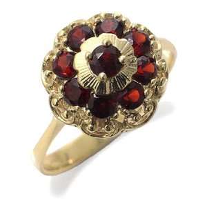   Ring in Yellow 9 carat Gold with Garnet, form Flower, weight 3.5 grams