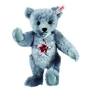 The Swarovski Teddy Bear Featuring the Swarovski Poinsettia Ornament 