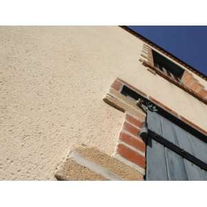  View of Exterior of Building with Window Shutters 