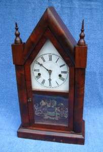   AMERICAN WATERBURY SHARP GOTHIC STEEPLE CLOCK WITH PAINTED LOWER GLASS