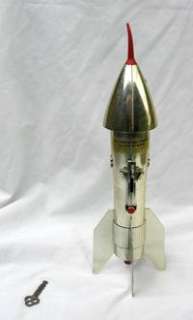 RARE GOLD 1957 GUIDED MISSILE SPACE ROCKET SHIP METAL BANK ASTRO MFG 