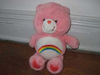 You are bidding on a vintage Care Bear Cheer Bear! A bit scruffy 