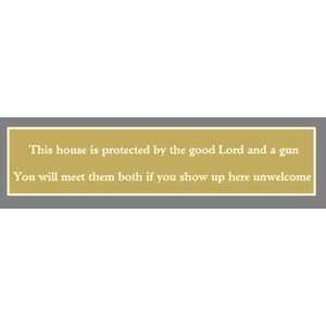 This house is protected by the good Lord and a gun 