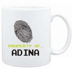  Mug White  Property of _ Adina   Fingerprint  Female 