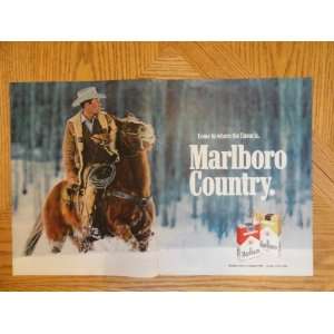 Marlboro Cigarettes 1971 magazine ad, cowboy/horse/snow. full 2 page 