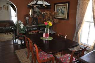 This is a beautiful Duncan Phyfe table. It is shown in photos with 