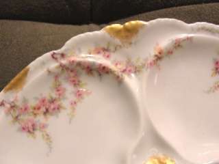 This is a Oyster Plate, with beautiful colors, and detailing on both 