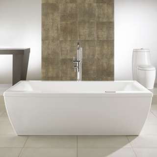 rectangular freestanding bathtub with a design softened by sumptuous 